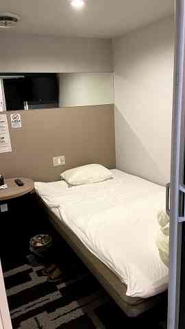 ホテルアベストグランデ岡山 のブース型個室のベッド